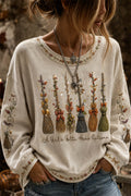 Lauren | Halloween-Inspired Beige Broom Print Round Neck Sweatshirt