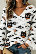 Francesca | Halloween-Inspired White Pumpkin Face Cat Print V Neck Long Sleeve Top